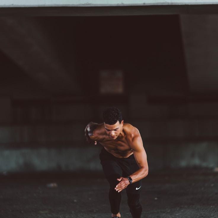 Women in a fitness class doing stretching and mobility exercises